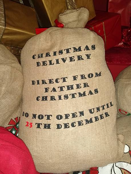 istock Father Christmas Delivery Sack with Festive Holiday Message 2253444177