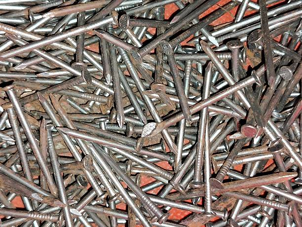close up of stacked nails
