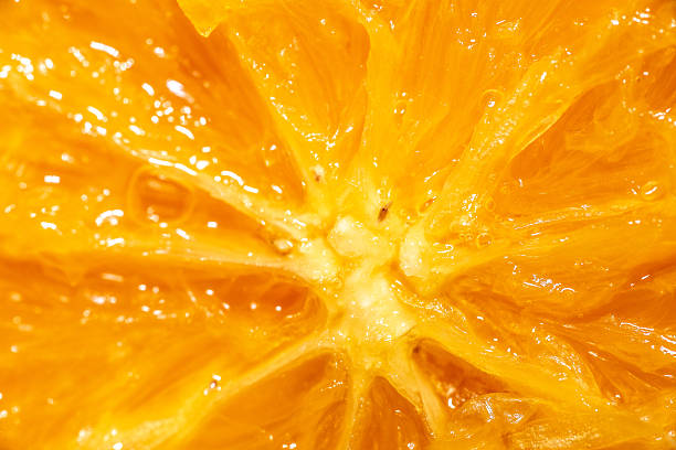 istock Close-Up of Juicy Orange Slice 2253448475