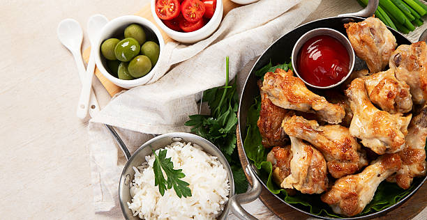 istock Grilled chicken wings with salt, spices and herbs. 2253449351