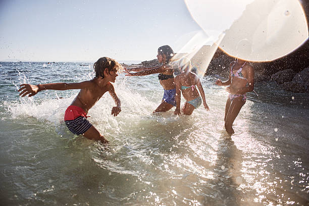 My daughters playing on Imperial Beach, California.  My younger one always skips and I caught her in the air here.