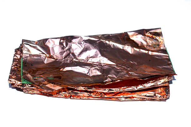 istock copper leaf flakes, tiny, thin pieces of genuine copper or copper alloy (like brass) hammered into fine sheets and then broken or cut into flakes 2253450190