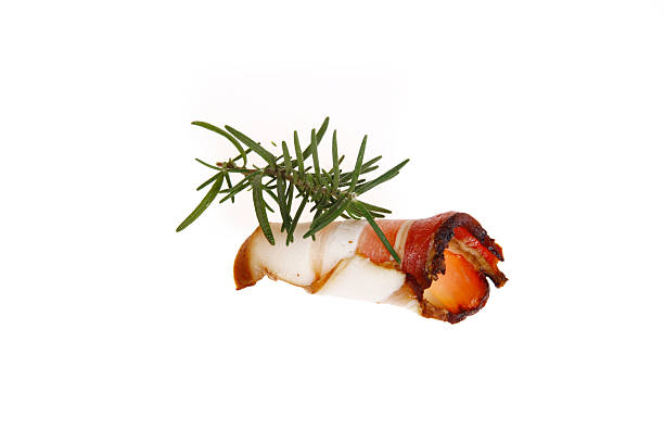 Italian prosciutto crudo or spanish jamon. Jerked meat, isolated on white background