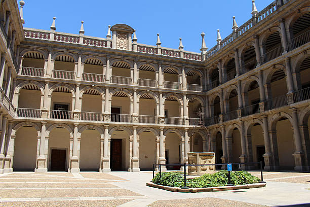 istock Cross and arched terrace inside the University of Alcala 2253458162