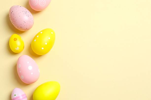 istock Happy Easter. Colorful eggs on color background, space for text or advertising 2253459847