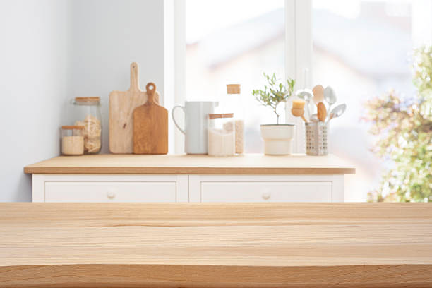 istock Wooden tabletop over defocused rustic kitchen counter background for product display and promotion 2253460094