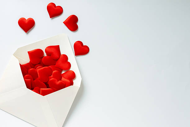 istock An image of love with an envelope overflowing with red hearts 2253460266
