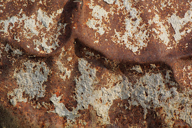 istock Rusty Metal Texture Background with Peeling Paint and Corrosion Detail 2253460884