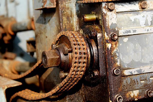 Rusty Industrial Chain Gear Mechanism on Old Machine with Corrosion