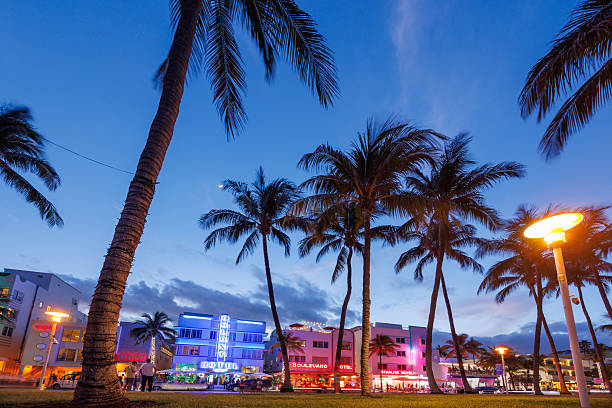 Miami, Florida, USA - May 31, 2025: Crowded Ocean Drive in Miami, packed with people, cars, and vibrant nightlife