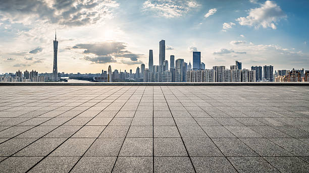 istock Empty square floor and city skyline with modern buildings. 2253461437