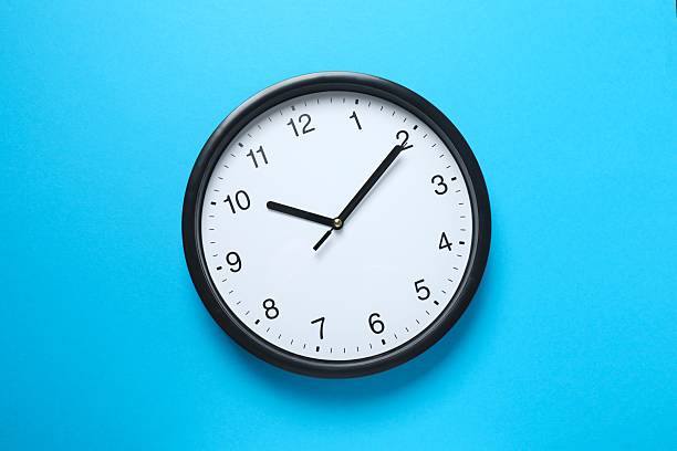 istock Big beautiful stylish clock on color background 2253462219