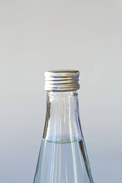 Tethered Bottle Cap Open, bottle of orange juice