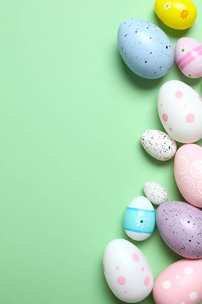istock Happy Easter. Colorful eggs on color background, space for text or advertising 2253462415