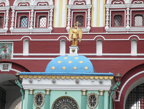 old building with gold religious monument