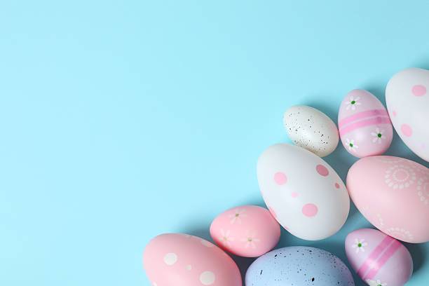 istock Happy Easter. Colorful eggs on color background, space for text or advertising 2253462856