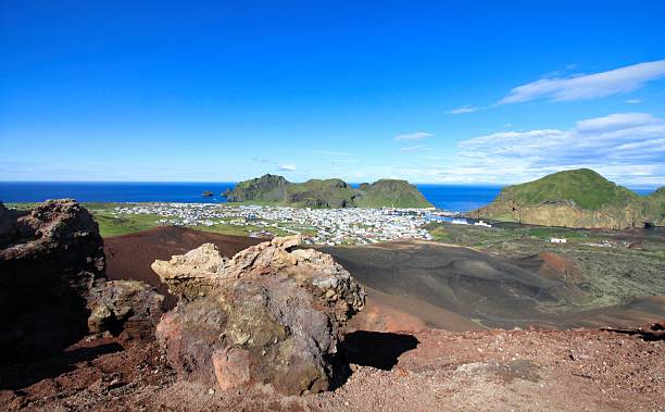 istock Panoramic view of Heimaey town from Eldfell volcano crater. 2253464059