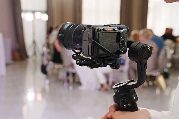 istock Camera setup for event filming in a banquet hall 2253465938