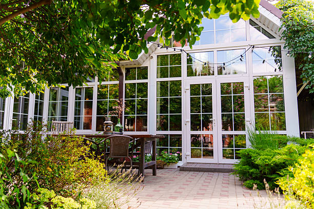 istock Garden area with seating and large windows at daytime 2253469550