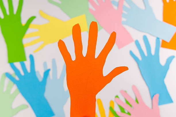 istock Colorful paper hands on white background for Human Rights Day representing perfect balance and universal protection. 2253472020