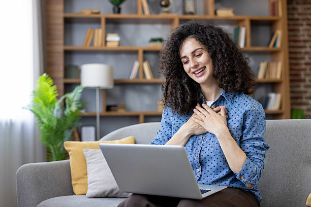 istock Woman expressing gratitude during online video call 2253472350