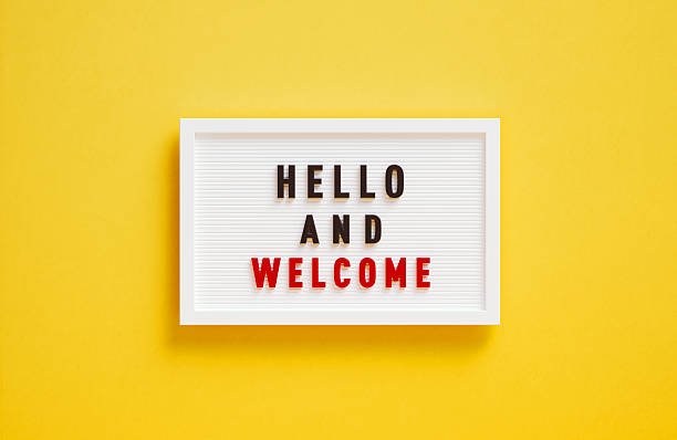 istock Hello And Welcome Written Lightbox On Yellow Background 2253472994