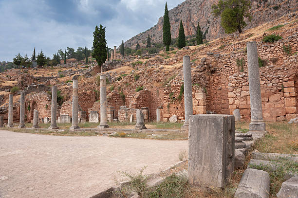 Temple of Apollo at Delphi, an archaeological site in Greece, on Mount Parnassus. Delphi is famous for the oracle in the sanctuary dedicated to Apollo. UNESCO World Heritage Site