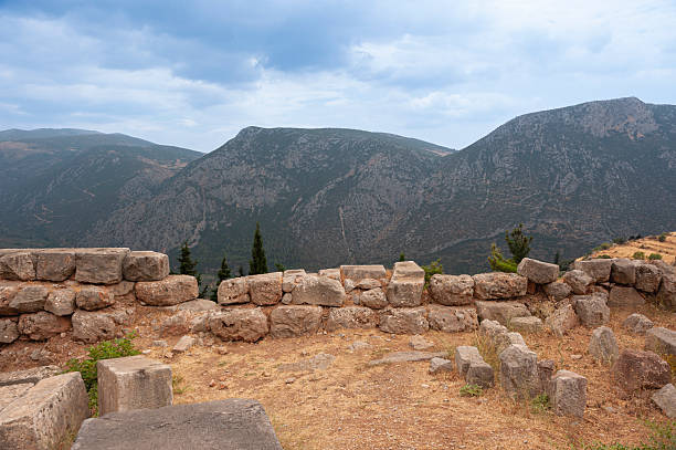 Temple of Apollo at Delphi, an archaeological site in Greece, on Mount Parnassus. Delphi is famous for the oracle in the sanctuary dedicated to Apollo. UNESCO World Heritage Site