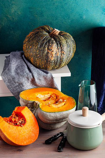 istock Whole and Sliced Pumpkin in Kitchen 2253475850