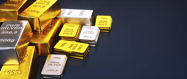istock A pile of shiny gold and silver ingots, with ample copy space. 2253483245