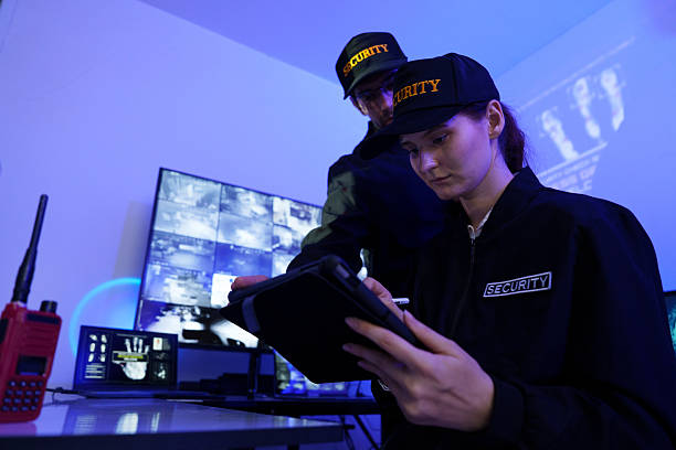 istock Security officers are checking the TV screen of the CCTV system. ( PHOTO ) 2253485662