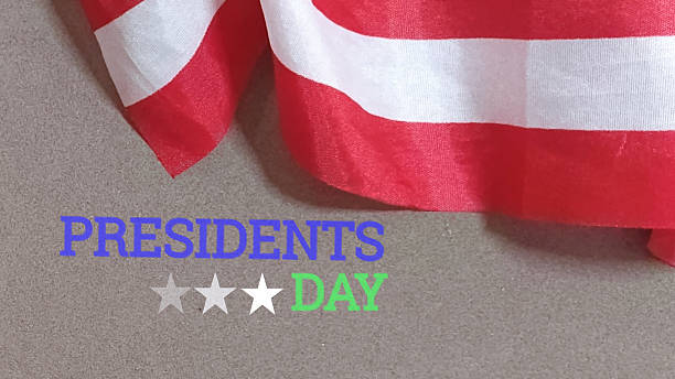 Patriotic Presidents Day setup with American flag on gray background