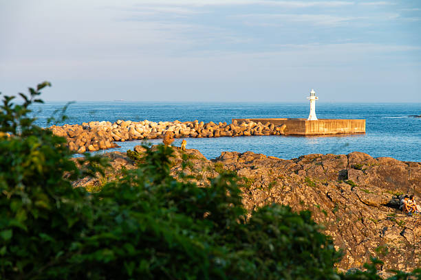 istock seascape with lighthouse and an island 2253486283