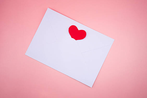 istock Minimal Valentine Card with Red Heart on Pink Background 2253487886