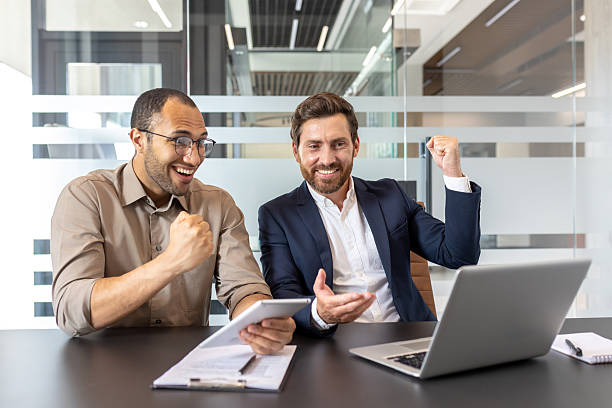 istock Business colleagues celebrate a successful project with excitement and joy. 2253496002