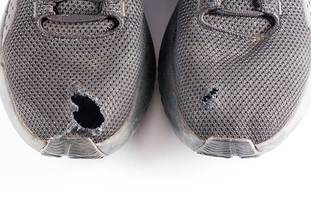 Children's muddy athletic shoes.