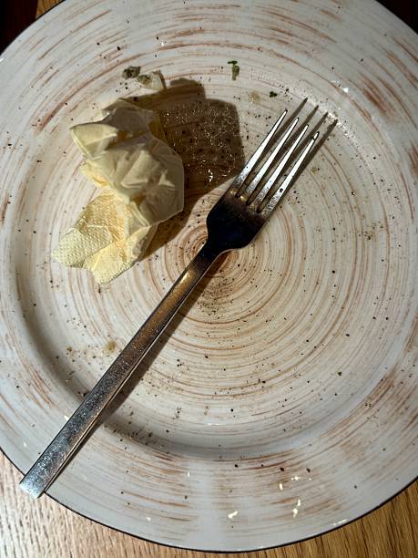 istock Two Empty Plates With Fork Napkin, Overhead View, Glass And Cutlery, Rustic Wood Tabletop, Mild Crumbs, Intimate Setting Suggesting Companionship, Soft Ambient Glow, Lingering Conversation 2253501143