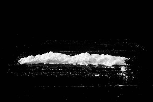 istock white powder on a black background close-up 2253501468