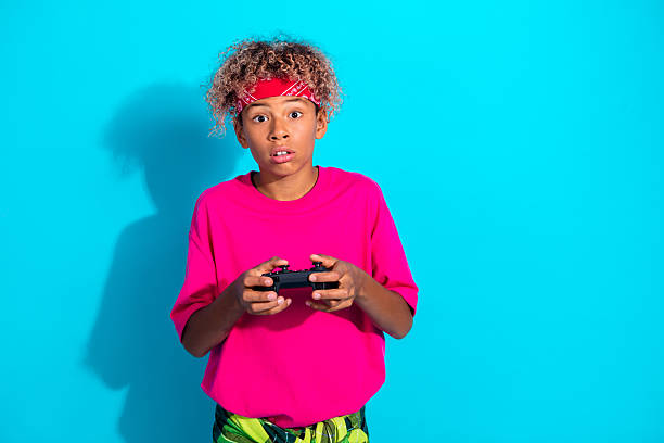 Little Boy playing Video Games at Home