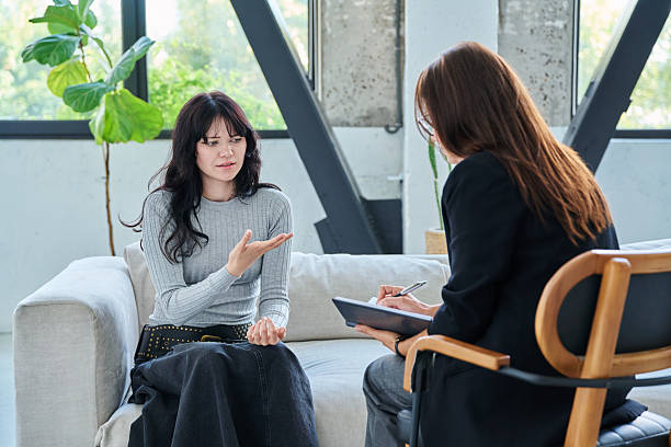 istock Psychology session for young female patient, professional help and support 2253503869