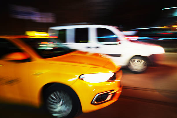 Taxi moves on the city street