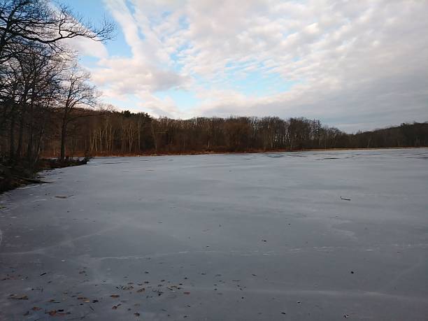 istock Evening Winter Sky Over Frozen Lake 2253506857