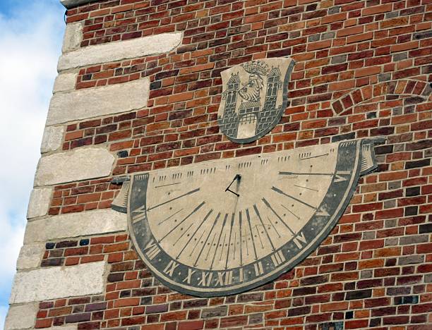 Sundial on the historic tower in the Old Town of Sandomierz, Poland