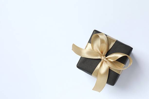 istock Beautiful gift box tied with bow on white background 2253521212
