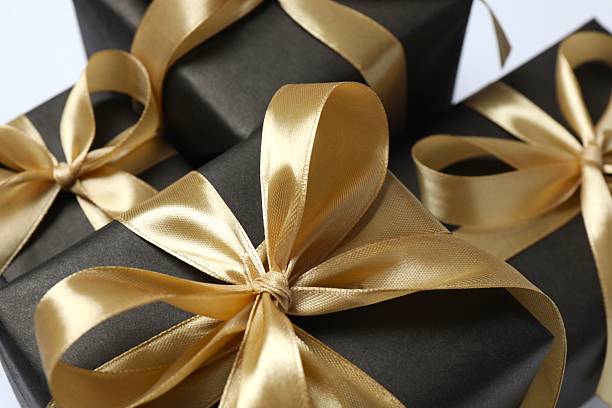 istock Beautiful gift boxes tied with bows on white background 2253521262