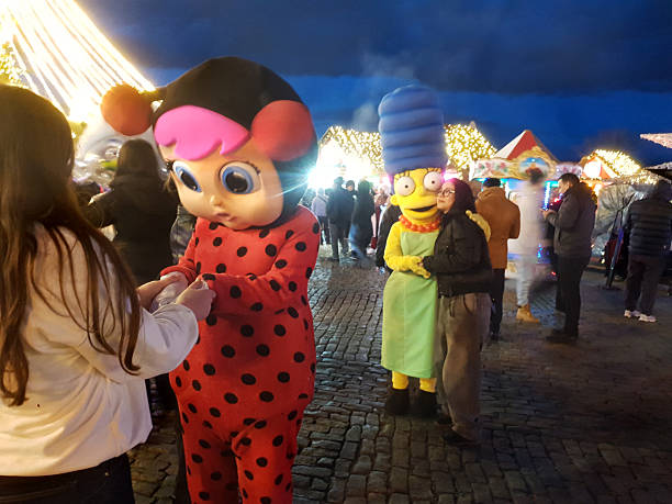 Tbilisi , GEO December 25 2025 Cartoon characters (artists) at a Christmas fairMarato