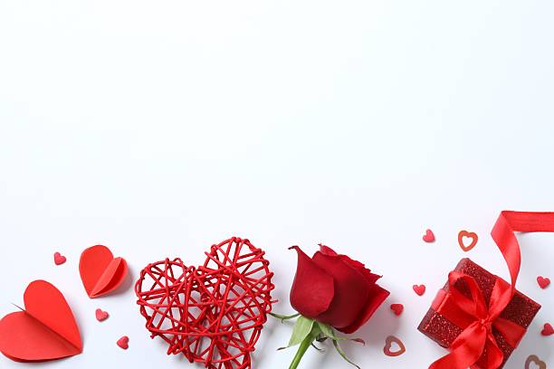 istock Beautiful red rose, gift box and hearts on white background 2253522268