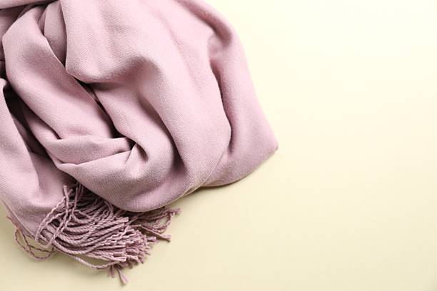 istock Warm scarf on a color background 2253525179