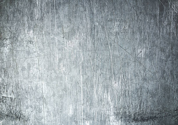 istock Texture of silver metal background, steel sheet with scratched pattern 2253525336
