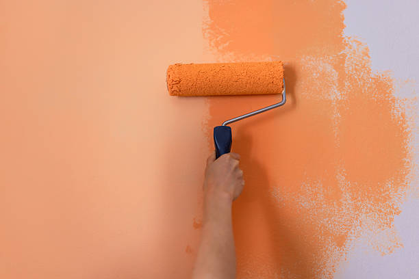 istock Hand Painting Interior Wall With Paint Roller 2253526153
